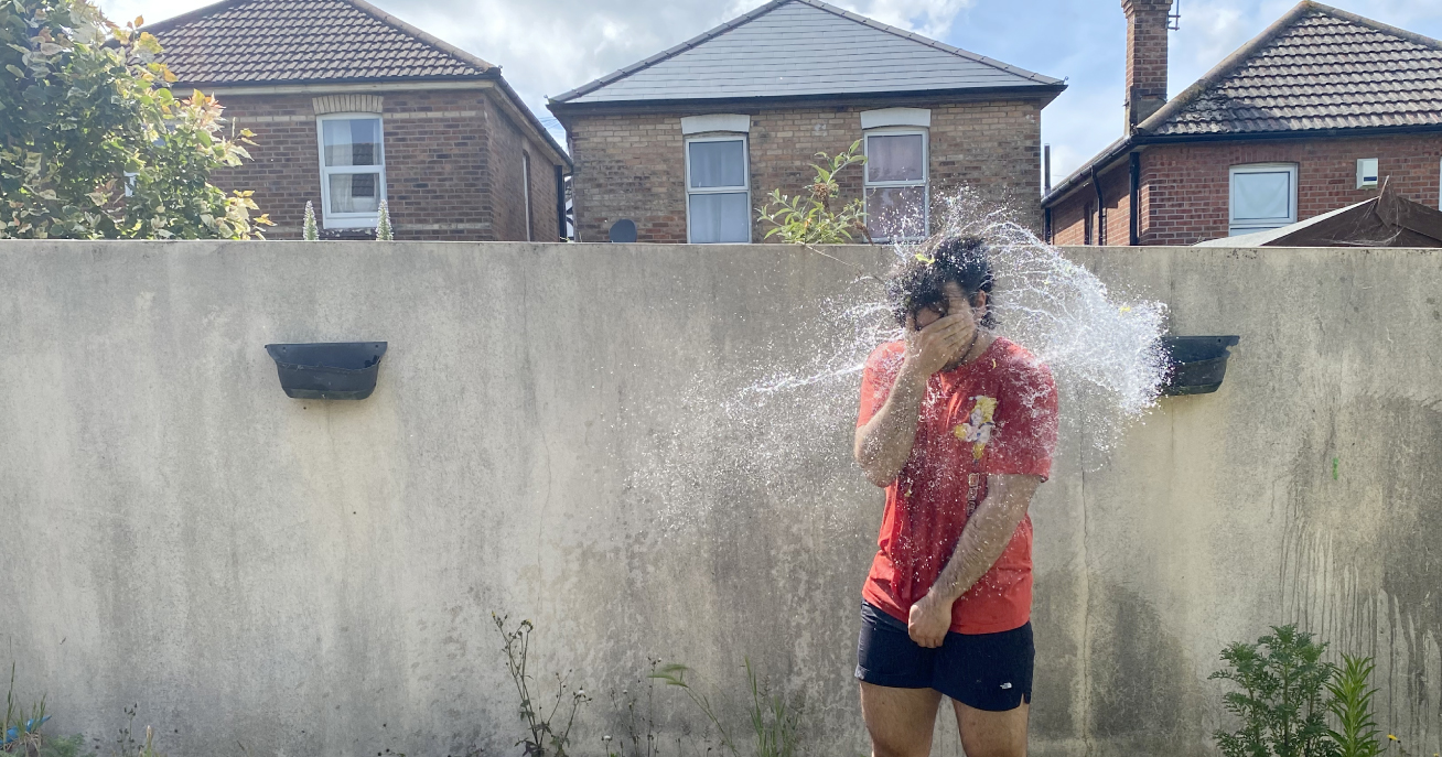 water balloon bursting on person